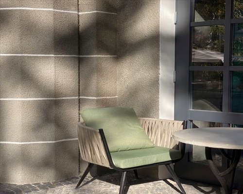 Mexican patio with soft daylight illuminating a comfortable reading space